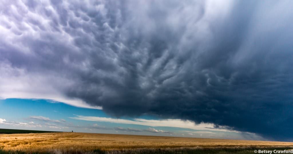 The wild thunderstorms of Kansas create their own landscapes along Route 40 in western Kansas by Betsey Crawford