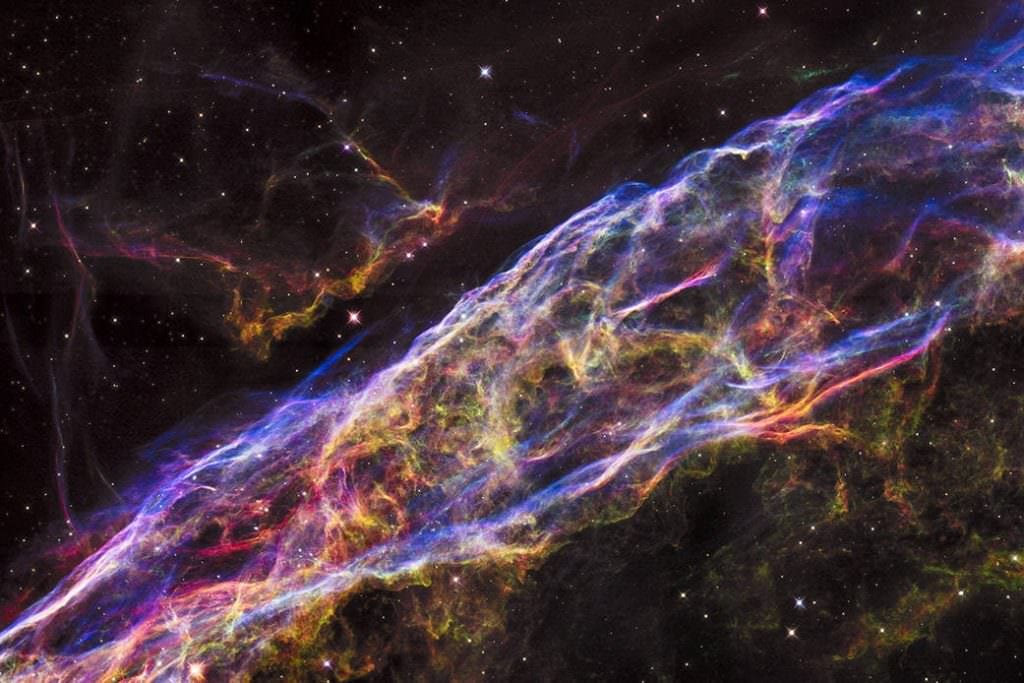 This small (2 light years across) section of a recent (8,00 years ago) supernova is called the Veil Nebula. Image Credit: NASA/ESA/Hubble Heritage Team